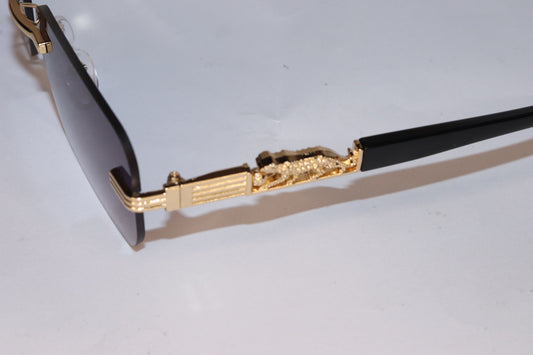 Sunglasses with gold frame and Purple lenses