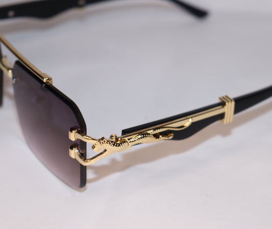 Gold-framed sunglasses with gradient lenses
