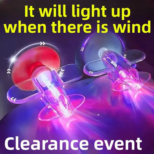 LED light-up toys with text indicating they light up in the wind and are on clearance.