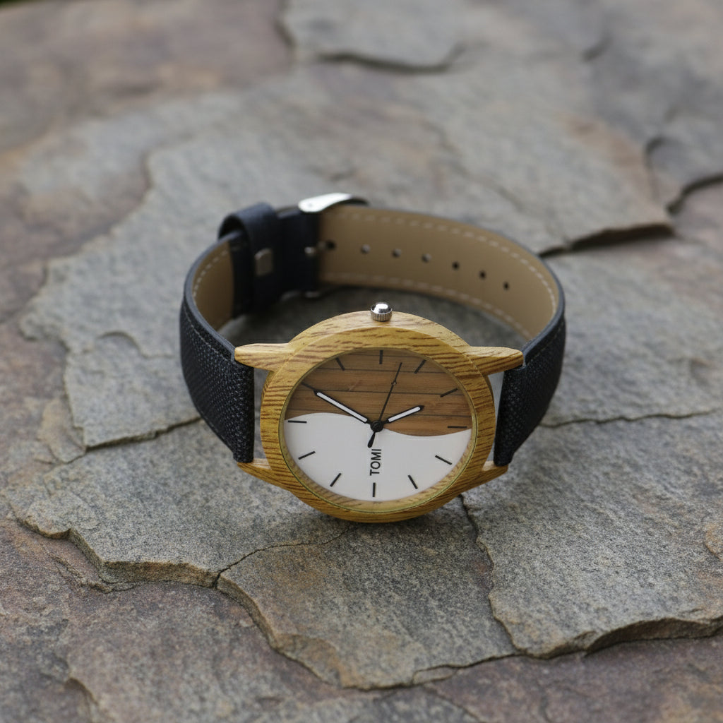 Wooden watch with black strap on a white background