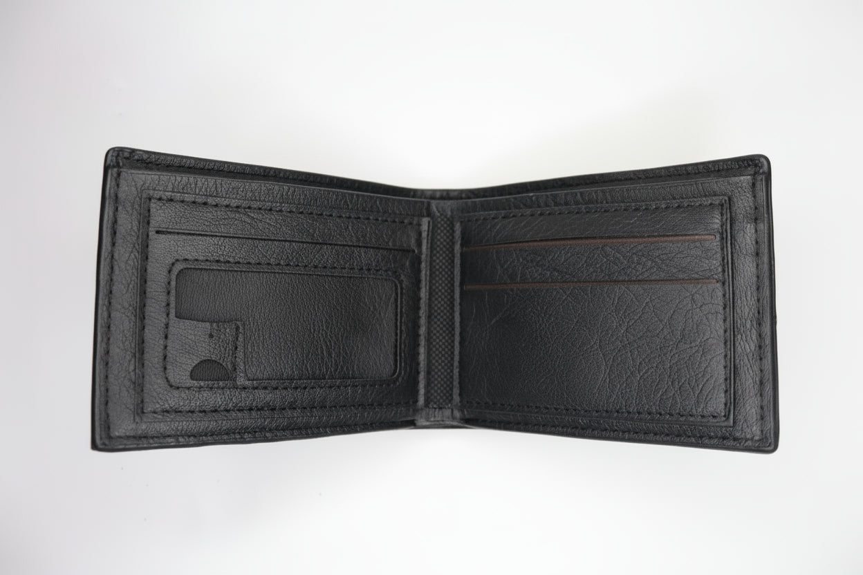 Black wallet on a metallic surface