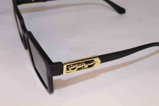 Black sunglasses with gold accents