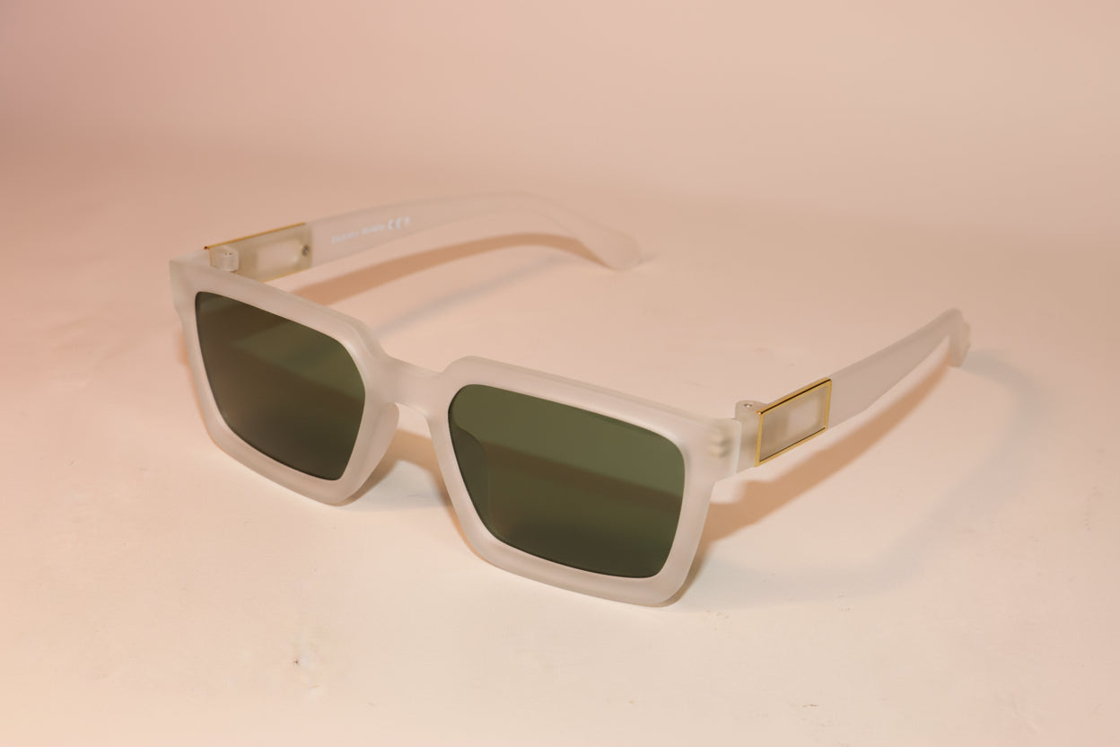Sunglasses with green lenses and beige frames