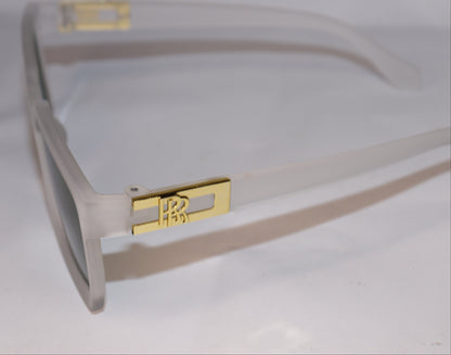 Sunglasses with green lenses and beige frames