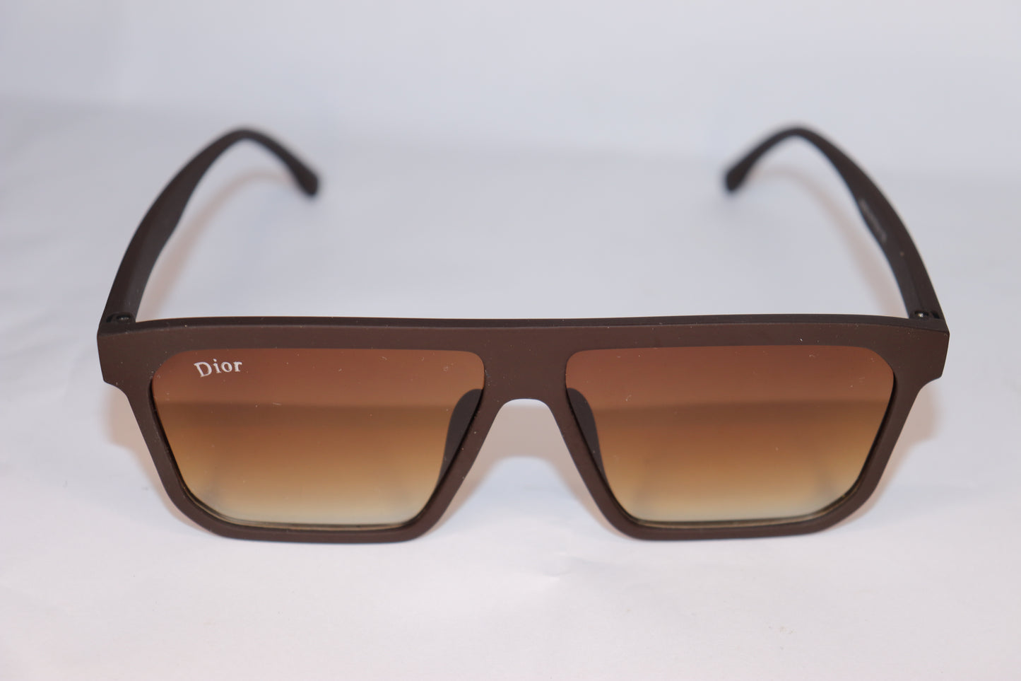 Brown sunglasses with 'Dior' logo