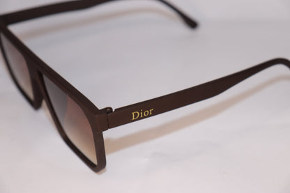 Brown sunglasses with 'Dior' logo on a white background