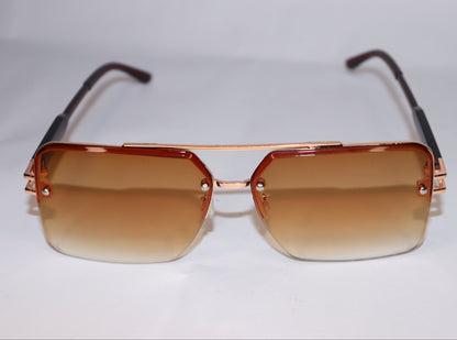 Sunglasses with brown gradient lenses and gold frame