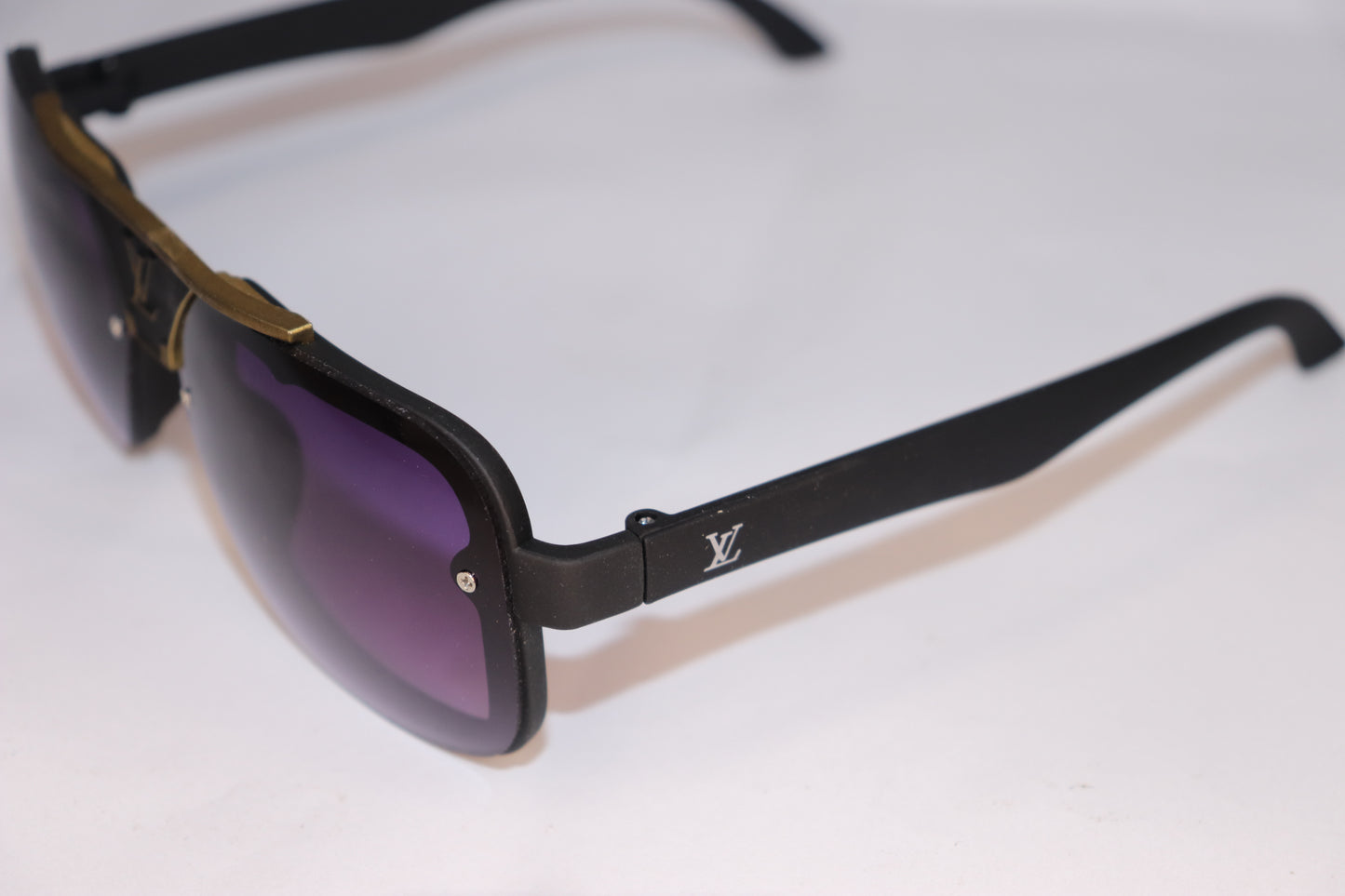 Sunglasses with a black frame and purple lenses