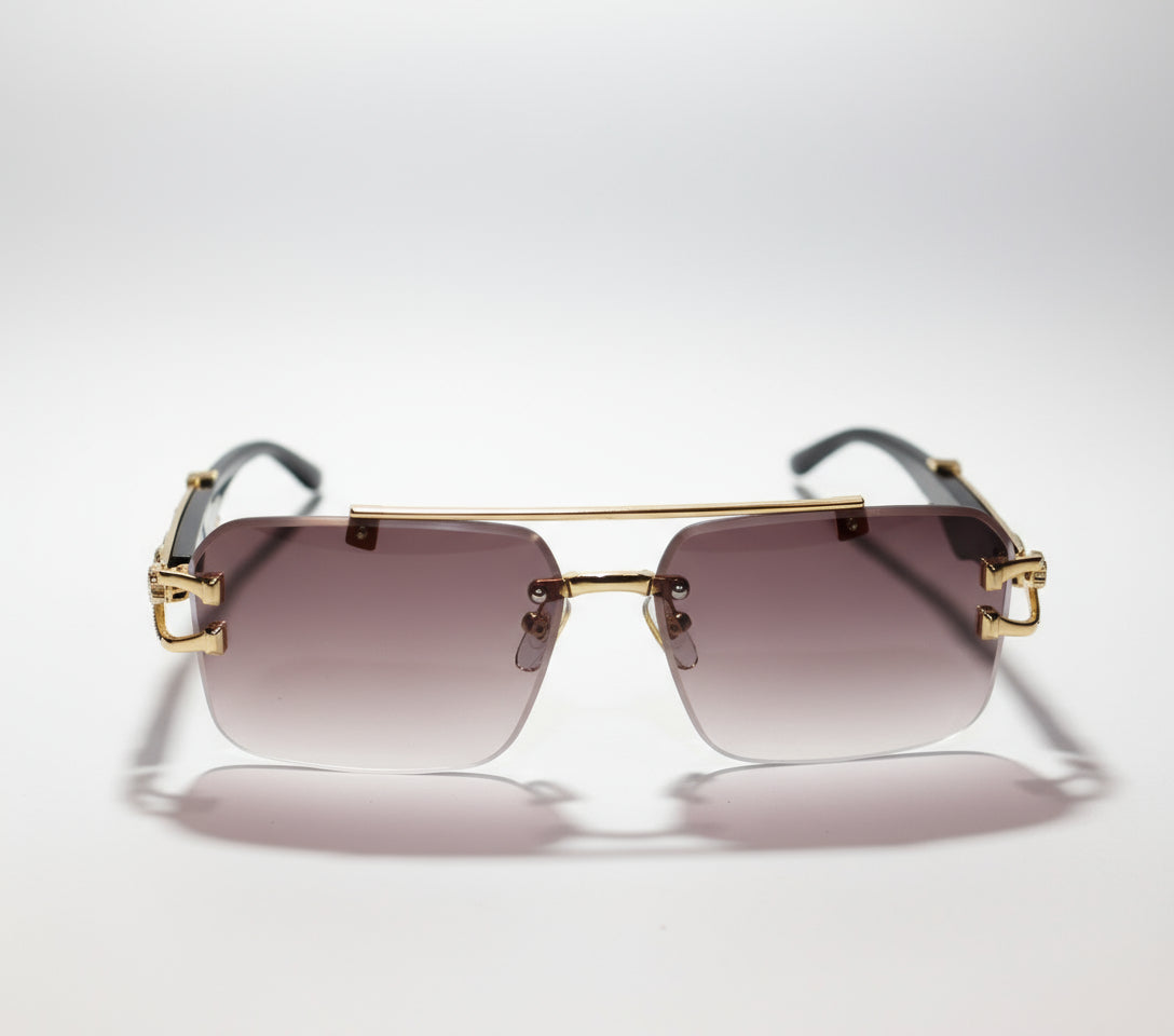 Gold-framed sunglasses with gradient lenses