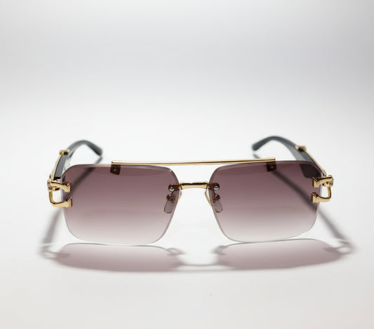 Gold-framed sunglasses with gradient lenses