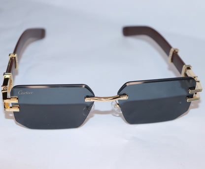 Gold-framed sunglasses with dark lenses