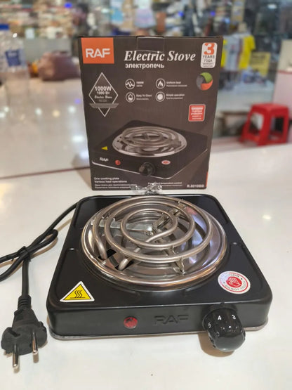 RAF electric stove on a counter with packaging in the background