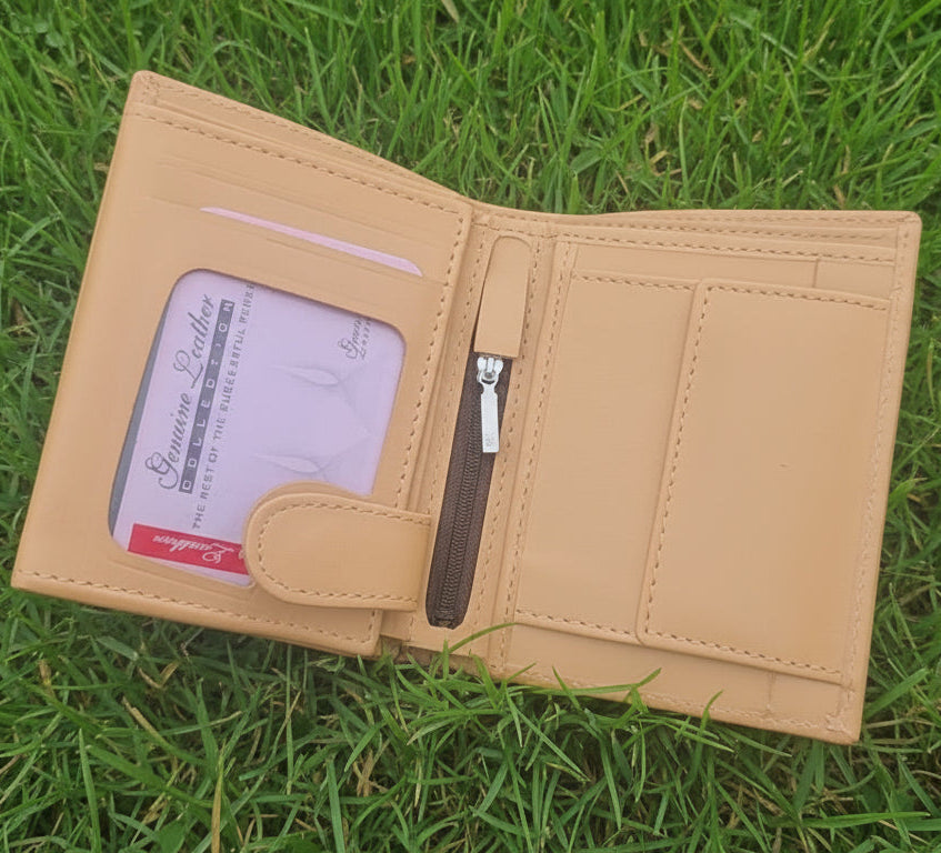 Beige wallet with a card holder on a light gray background